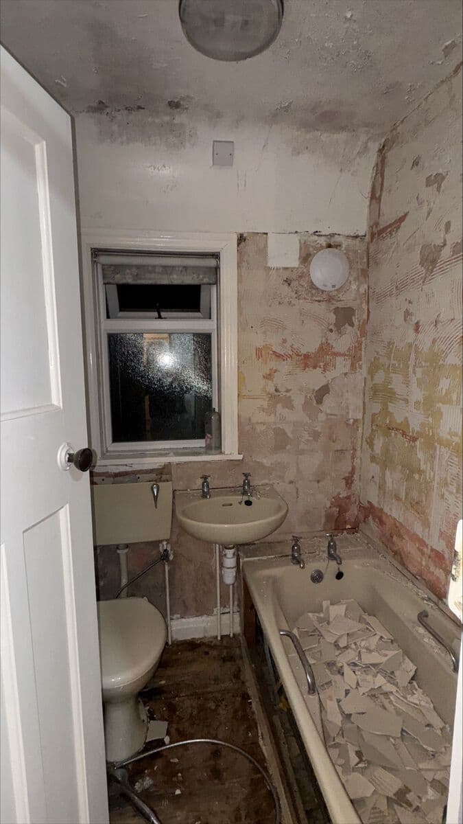 Complete bathroom refit with walk-in shower, vanity unit, and new flooring - before
